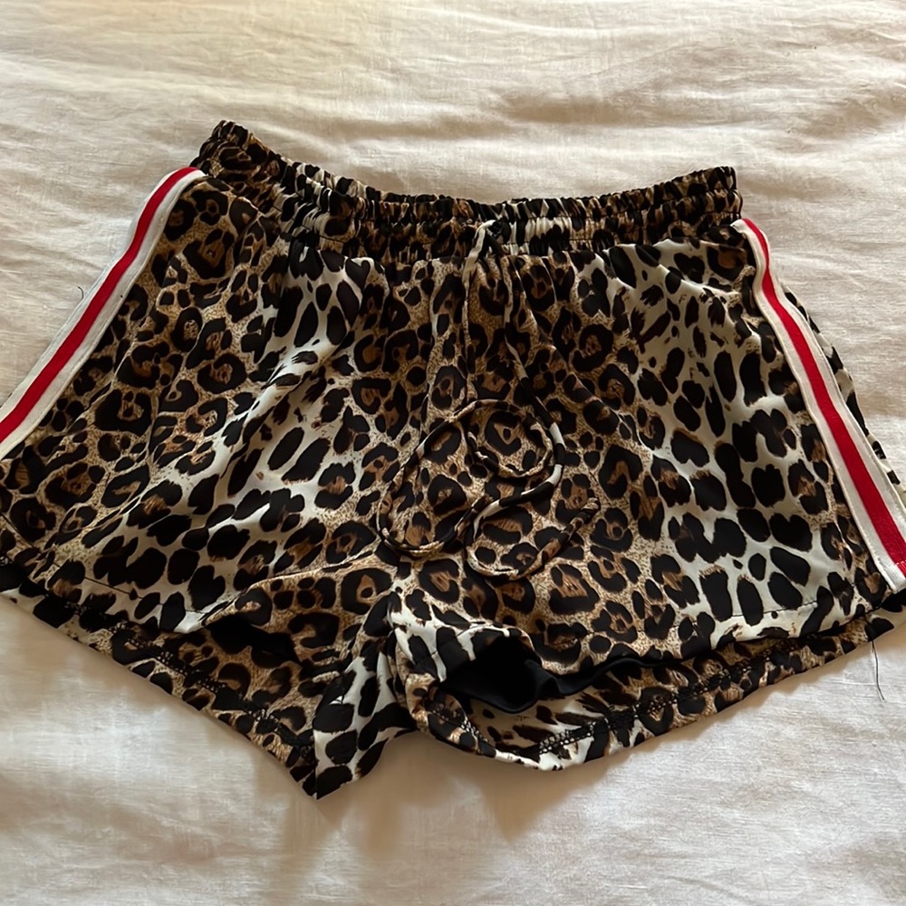 Vintage Havana shorts with red stripe on side.